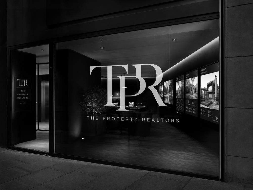 TPR branded window & shopfront signage